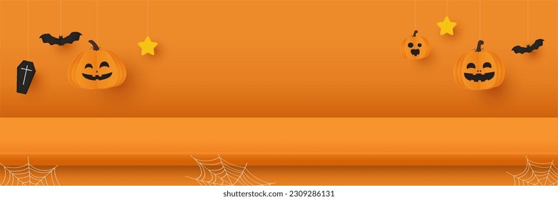 Happy halloween banner. Empty tabletop or shelf for product display presentation with pumpkins, bat and coffin on orange background. Shelves to show product suitable for advertising