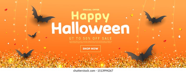 Happy Halloween calligraphy with paper bats and stars decor and candy. Special offers, discounts, deals, seasonal clearance advertisement and promotion.