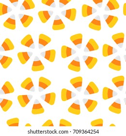 Happy Halloween. Candy corn. Seamless Pattern. Round flower shape. Wrapping paper, textile template. Print template. Flat design White background. Vector illustration.