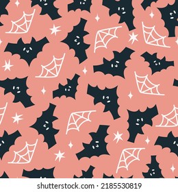 Happy Halloween cute vector seamless pattern with cartoon bat, stars. Creative childish texture in scandinavian style. Great for fabric, textile Vector Illustration.
