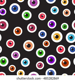 Happy Halloween. Eyeballs. Seamless pattern repetitive scattered on a black background. Vector illustration. Concept eyes Halloween night.