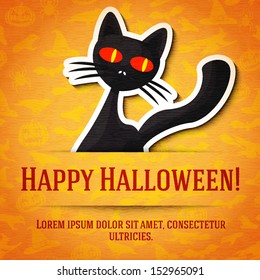 Happy halloween greeting card with black cat sticker cut from the paper and placed between ribbon and background. On the bright halloween texture with bats, witches, hats, spiders, pumpkins. 
