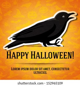 Happy halloween greeting card with black raven sticker cut from the paper and placed between ribbon and background. On the bright halloween texture with bats, witches, hats, spiders, pumpkins. 