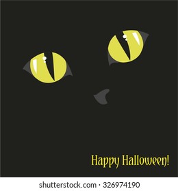 Happy Halloween greeting card with cat eyes