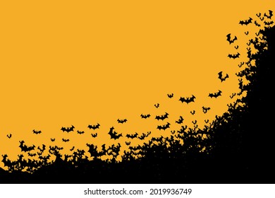 Happy Halloween. Group of bats flying on orange background 