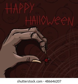 Happy Halloween. Hand and spider on a brown background