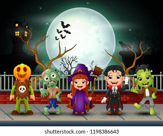 Happy halloween kids in full moon background