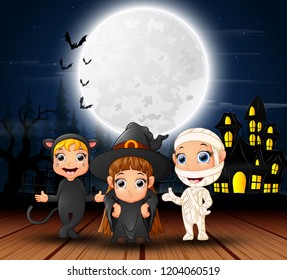 Happy halloween kids with scary house and full moon in the night