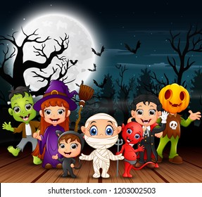 Happy halloween kids wearing costume in the night