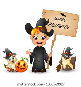 Happy Halloween with little witch holding a wooden sign letter