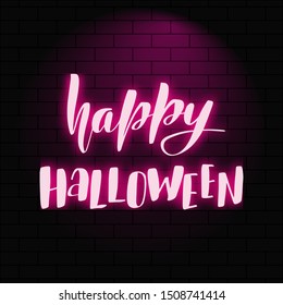 Happy halloween. Neon glowing lettering on a brick wall background. Vector calligraphy illustration. Typography for banners, badges, postcard, t-shirt, prints, posters.