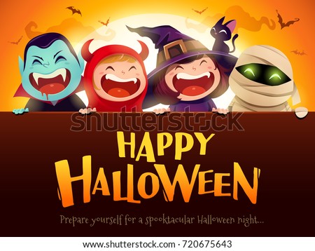 Happy Halloween Party. Group of kids in halloween costumes with big signboard. In the moonlight.