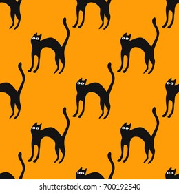 Happy Halloween pattern with cats. Seamless pattern. Vector illustration.
