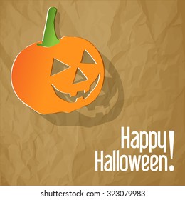 Happy Halloween postcard with pumpkin on a crumpled paper brown background.