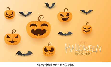 Happy Halloween pumpkins with paper bats.