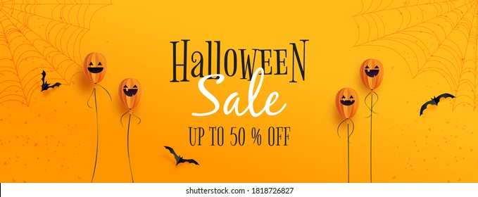 Happy halloween sale banner background template.Halloween ghost balloons and flying bats on orange background paper cut style.