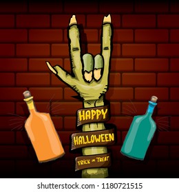 Happy halloween vector greeting card with zombie hand and greeting text on dark brikc wall background. vector halloween background or poster