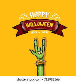 Happy halloween vector greeting card with rock n roll gesture green monster zombie hand and hand drawn calligraphic text on orange background. vector hand drawn halloween design elements set