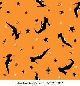 Happy Halloween vector seamless pattern with witch shoes and stars