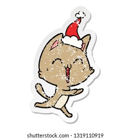 caricatura de sticker angustiado dibujado con la mano feliz de un gato maullando sombrero santa