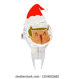 happy hand drawn retro cartoon of a astronaut wearing santa hat