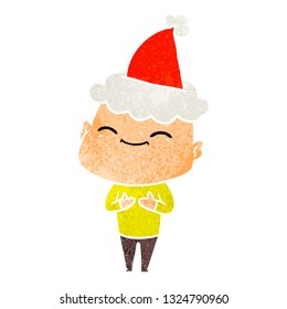 happy hand drawn retro cartoon of a bald man wearing santa hat