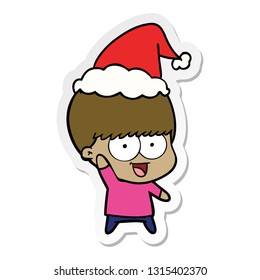 happy hand drawn sticker cartoon of a boy waving wearing santa hat