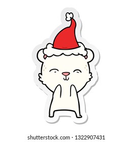 happy hand drawn sticker cartoon of a polar bear wearing santa hat