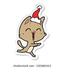 caricatura de pegatina dibujada a mano feliz de un gato maullando con sombrero de santa