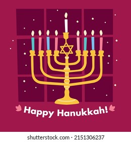 Happy Hanukkah menorah chandelier in front of a window and all the  candles lighten.