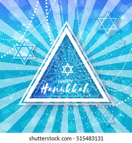 Happy Hanukkah with origami blue Magen David stars.