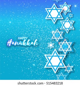 Happy Hanukkah with origami Magen David stars.