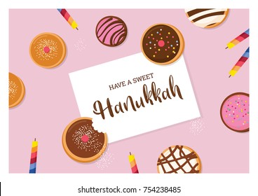 happy Hanukkah- traditional Jewish holiday . traditional doughnut  and candles