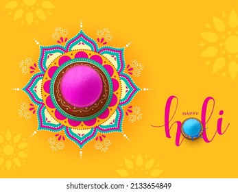 Happy Holi Celebration Concept With Top View Of Dry Color (Gulal) In Traditional Mud Pot On Beautiful Mandala (rangoli) Orange Background.