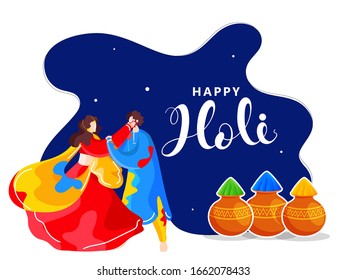 Happy Holi Concept with Powder Colors in Traditional Pots and Young Indian Couples Playing Colors. 