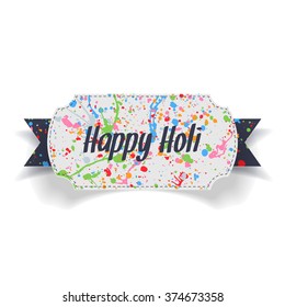 Happy Holi Text and color Splashes on paper Label