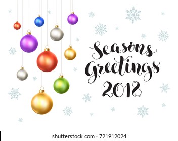 Happy holidays 2018 postcard template. Modern lettering with snowflakes ans Christmas balls isolated on white background. Colorful New Year greeting card concept.