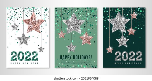 Happy Holidays banners set of three sheets with shimmer hanging stars, emerald confetti and 2022 numbers. Vector flyer design templates for greeting cards. All layered and isolated