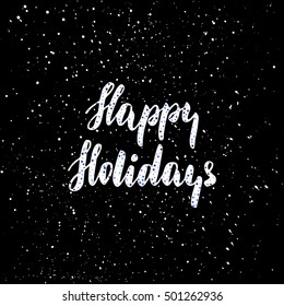 Happy holidays - freehand ink hand drawn calligraphic design for Xmas greetings cards, invitations. Handwritten calligraphy on black subtle ink spotted texture background. Vector illustration.