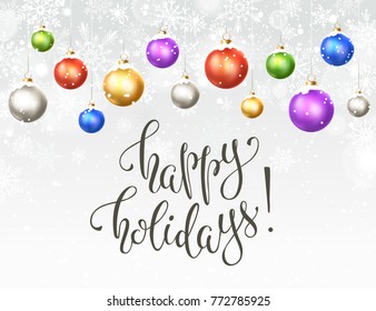 Happy holidays greeting card. Colorful and bright Merry Christmas balls with snowflakes on blue background. New Year vector illustration. Modern calligraphy.Horisontal composition from Christmas balls