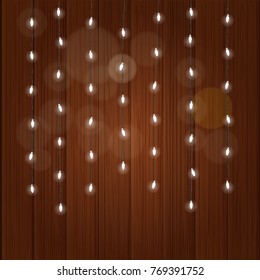 Happy holidays greeting card. lighting garland illustration. Glowing lamps on wood wall
