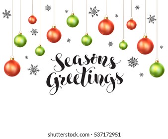 Happy holidays greeting card template. Modern New Year lettering with snowflakes ans Christmas balls isolated on white background. Season's greetings vector illustration with text.