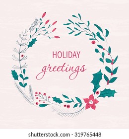 Happy holidays greeting card. Winter wreath with berries, pine branches, leaves.  Hand drawn Christmas Holiday design for greeting cards, calendars, posters, prints, invitations.