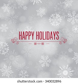 'Happy Holidays' greeting with snowflake background. 