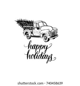 Happy Holidays lettering on white background. Vector hand drawn toy pickup illustration.  Merry Christmas greeting card, poster template.