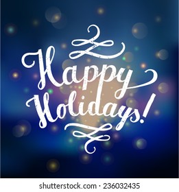 happy holidays lettering with shiny bokeh