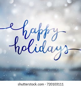 happy holidays lettering, vector handwritten text on blurred background of winter landscape