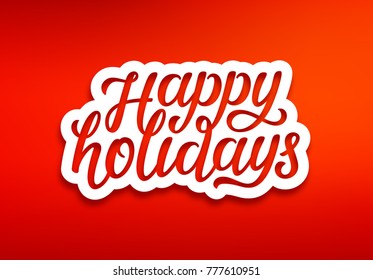 Happy Holidays Text On White Paper Label With Carving Over Red Background. Modern Calligraphy Lettering On Sticker For Seasons Greetings. Vector Background