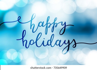 happy holidays, vector lettering on blurred background