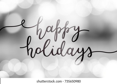 happy holidays, vector lettering on blurred background